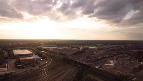 Aerial-of-railroad-yard-at-sunset