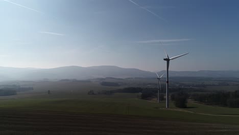 Windmills-in-beautiful-light-in-Czech-Republic---aerial-slowmo-shot