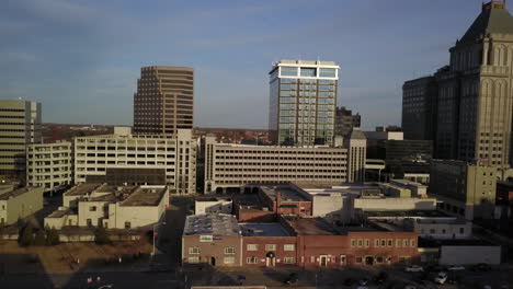 Aerial-shot-of-the-Greensboro-North-Carolina-skyline-as-camera-pulls-out