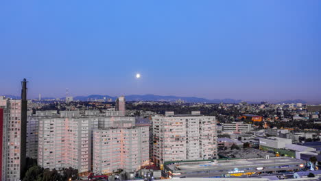 Aerial-hyeprlpase-of-buildings-and-free-way-in-the-San-Antonio-zone-of-Mexico-City-with-full-moon