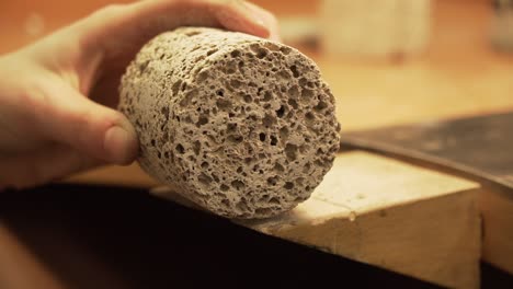 Shaking-with-concrete---geopolymer-cylinder-because-of-dust-in-slow-motion