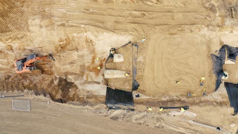 Aerial-view-of-a-working-excavator-in-the-mine