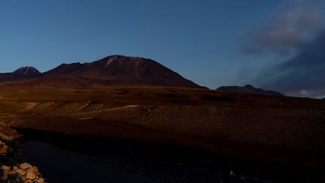 Lascar-and-Licancabur-Volcano-timelapse-in-Atacama-Desert-at-sunset,-South-America,-Chile