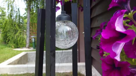 Wind-bell-sounds-in-the-countryside-surrounded-by-flowers-and-wind