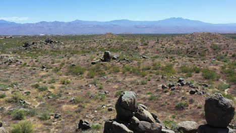 Aerial-fly-over-the-McDowell-Sonoran-Conservancy-desert-lands-towards-Four-Peak,-Matazel-Mountains,-Scottsdale-Arizona