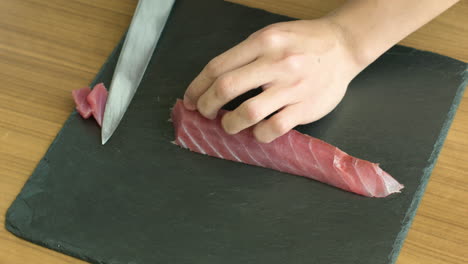 Slowly-and-Precisely-Slicing-Fish-Meat