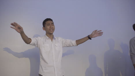 Young-Cambodian-man-worshipping-during-a-Christian-worship-service-in-Cambodia