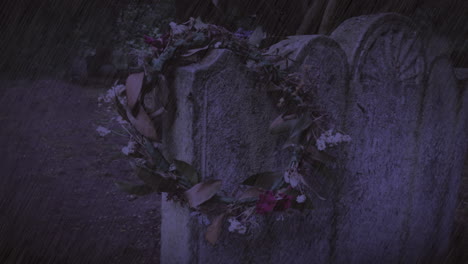 Withered-wreath-on-ancient-gravestone-in-thunderstorm