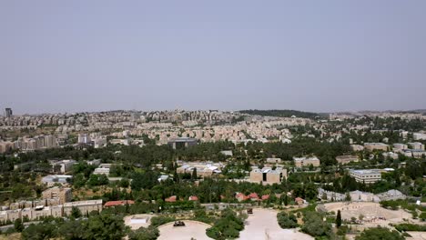 Jerusalem,-Israel,-neighborhood-fly-over-to-Shrine-of-the-Book-land-mark,-aerial-drone-shot