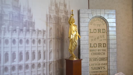 A-shot-of-a-miniature-model-of-the-Statue-of-Angel-Moroni-that-sits-atop-Mormon-Temples