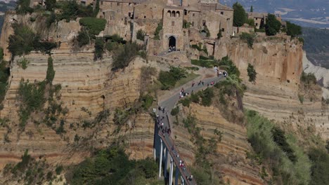 Close-shoot-of-the-walking-bridge-that-connects-the-dying-town-Civita-di-Bagnoregio-with-visiting-tourists-during-the-day