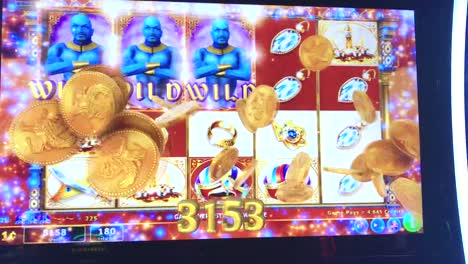A-winning-slot-machine-hitting-a-WILD-WILD-WILD-Genie-on-the-right-side-of-the-screen