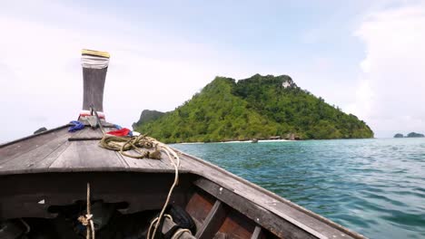 Point-of-view-ship-moving-and-the-adventure-seascape-background-of-the-trip-journey-by-tourist-boat-at-Krabi-in-Thailand-at-clear-summer-day-with-blue-sky