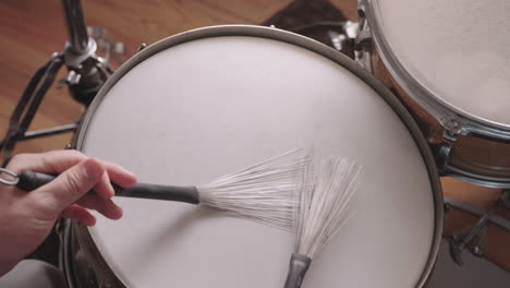 Jazz-Drummer-Plays-Snare-Drum-With-Brushes,-Overhead,-Slow-Motion