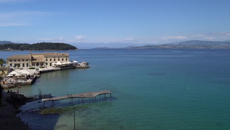 Sunbathing-and-dinning-at-the-picturesque-Faliraki,-Kerkyra-town,-Corfu