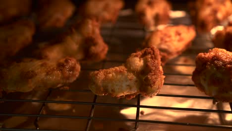 Roasting-chicken-wings-in-the-oven,-perfectly-coated-southern-wings-in-spice,-chilli-and-herbs-are-baked-at-high-temperature-in-the-oven