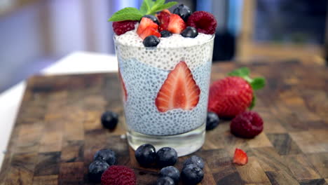 blue-spirulina-chia-pudding-with-white-coconut-chia-pudding-and-strawberries-and-blueberries-plus-raspberries,-healthy-food-option-choice
