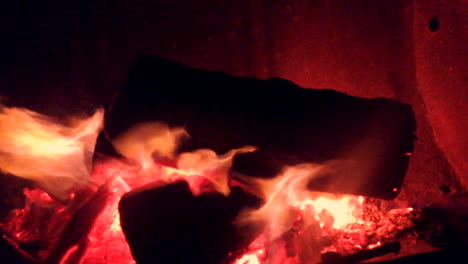 Fire-blazing-a-campsite-with-warm-red-and-yellow-colours