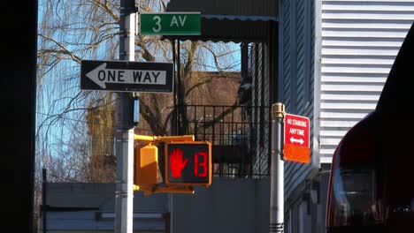 Pedestrian-traffic-light-countdown,-Red,-white,-One-Way-Sign,-4K-60P-Daytime,-Brooklyn-New,-York-City