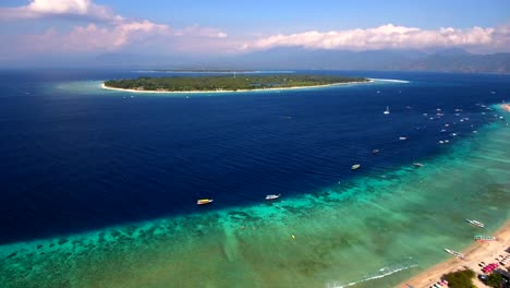 Aerial-View-of-tropical-reef-coast-line-up-above-from-a-drone-in-4k,-rotating-view