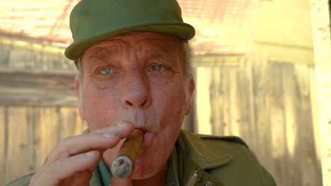 Handsome-elderly-male-smoking-a-cigar
