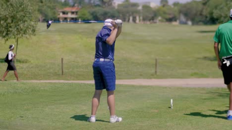 Young-Male-Golfer-Practicing-Swing-in-Slow-Motion
