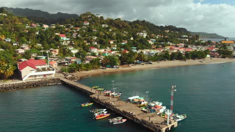 Epic-aerial-view-of-a-fish-market-in-the-countryside-of-the-spice-island,-Grenada