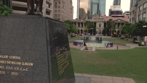 Sir-William-Glascow-monument,-Brisbane's-Anzac-Square,-with-City-Buildings