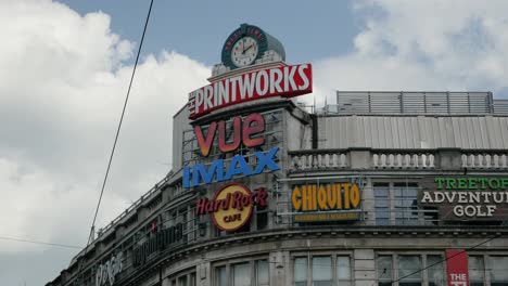 Printworks-tourist-attraction-Greater-Manchester-with-summer-sunny-day-landmark-in-the-city-sign-middle-framed-4K-25p