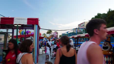 Hyperlapse-of-a-children-fair-in-Alicante,-summer-sunset