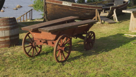 Old-horse-carriage,-wooden-boat.-Panorama-to-right