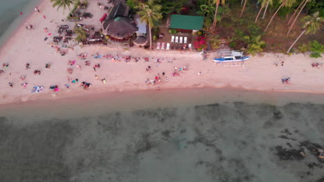 Bird's-eye-aerial-truck-shot-of-beach-in-La-Union,-Philippines