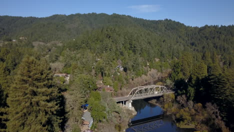 Drone-flying-over-the-top-of-a-truss-bridge-on-the-Russian-river-in-Sonoma-county-California