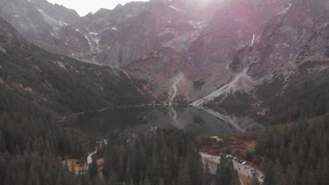 Amazing-drone-shoot-entering-the-Morkie-Oko-lake-in-the-National-Park-of-Tatry,-Poland