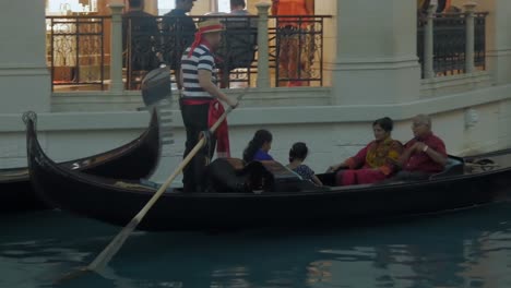 Tourist-family-taking-a-gondola-ride-at-the-Venetian-Las-Vegas
