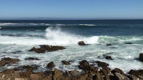 Waves-breaking-against-rocky-shoreline