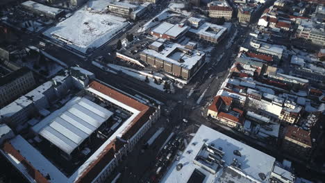 Flying-above-main-intersection-in-Nitra-City,-Winter,-Aerial-shot,-Slovakia