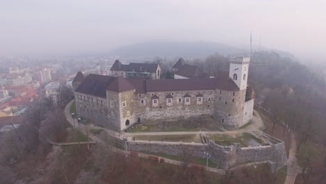 Aerial-View-from-above-of-beautiful-fortress-Ljubljana-Castle-on-the-hill-in-Slovenia