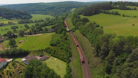 freight-train-working-its-way-through-countryside