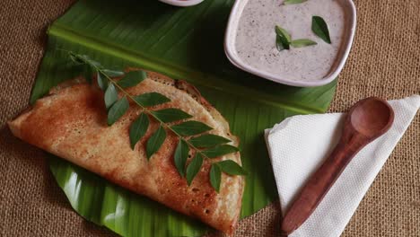 Rotating-Masala-Dosa---Indian-Savory-Crepes-with-potato-filling-,-top-down-view