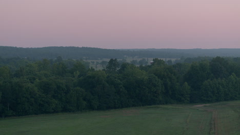 Drone-descends-over-beautiful-countryside-at-dawn
