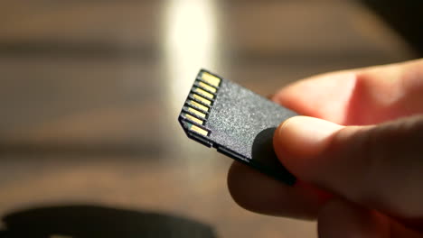 Close-up-macro-shot-of-a-standard-SD-card-for-use-with-data-storage,-photography,-and-video-cameras-for-film-makers