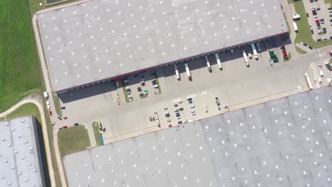 Aerial-Shot-of-Logistics-Center-with-Trucks