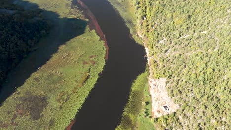 An-aerial-view-of-Lake-Skadar-in-Montenegro-on-the-bend-of-the-river-during-a-beautiful-sunny-day