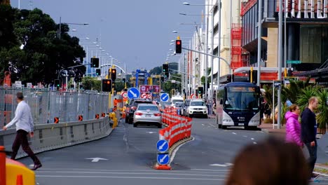 Road-works-and-sloweded-car-traffic---construction-of-screens-in-downtown-Auckland-CBD---New-Zealand-on-May-21,-2019