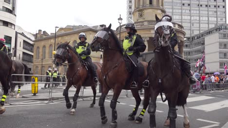 Police-horses-deploy-near-the-BBC-studio-during-the-Free-Tommy-Robinson-in-London,-UK