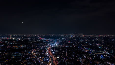 Aerial-shot-of-the-aerial-traffic-in-Mexico-City-at-night