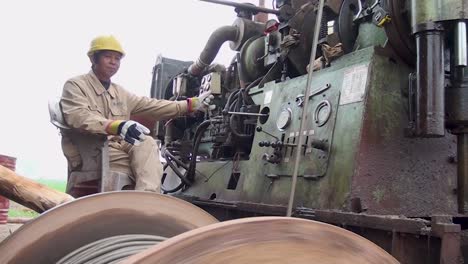 A-Chinese-Worker-Operates-Heavy-Mining-Machinery
