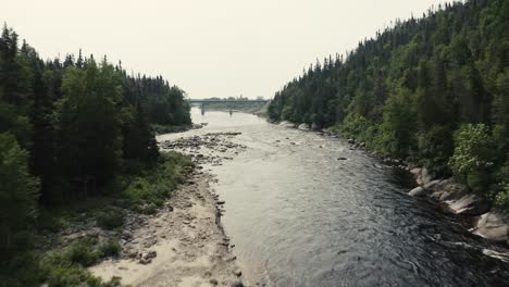 4K-Salmon-river-going-downstream---Drone-flying---open-ocean
