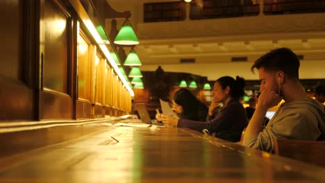 State-Library-Victoria-at-nighttime-people-studying-at-melbourne-library-Melbourne-tourism-attractions,-melbourne-library